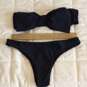 Black bandeau bikini with beautiful bow tie on the top.   Size S